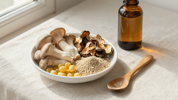 Various forms of functional mushroom supplements, including fresh and dried mushrooms, herbal powder, yellow softgel capsules, and an amber glass tincture dropper bottle